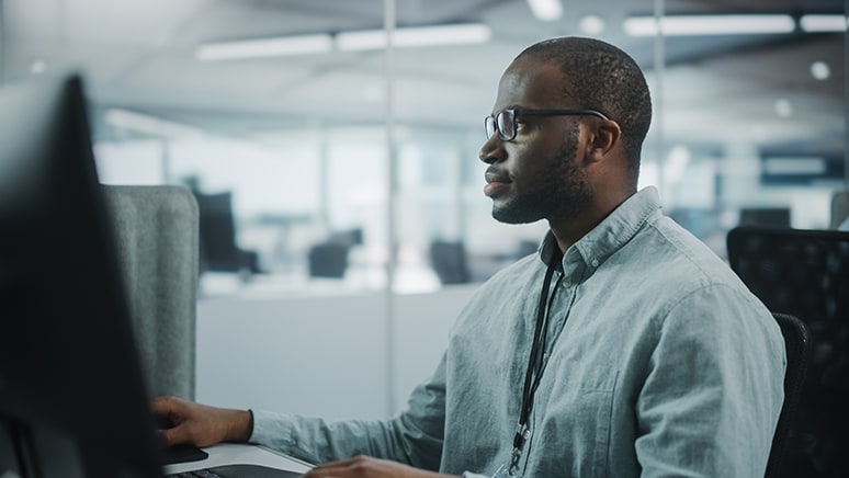 man front a computer