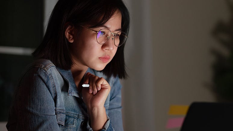 woman in front of computer